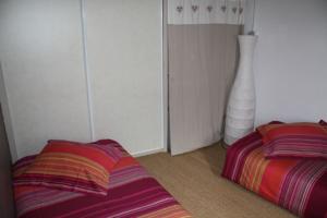 Appartement La petite maison : photos des chambres