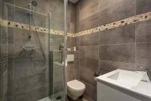 Appartement The Pearl : photos des chambres