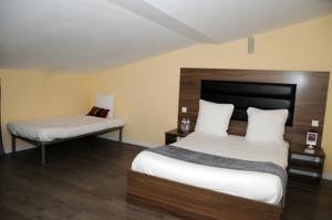 Akena Hotel Du Commerce : photos des chambres