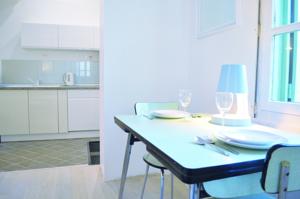 Appartement Le Cheval Blanc : photos des chambres