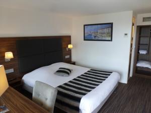 Hotel Kyriad Bordeaux Ouest - Merignac Aeroport : photos des chambres