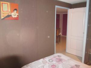 Appartement Maison Tifaloc : photos des chambres