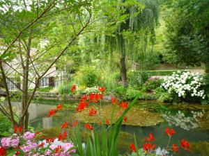 Hebergement Moulin de charme au jardin : photos des chambres