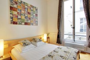 Appartement Louvre Apartments : photos des chambres