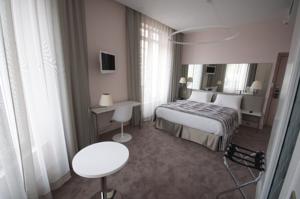 Le Cesar Hotel : photos des chambres
