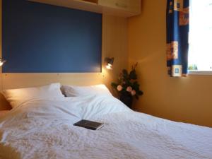 Hebergement Holiday home Camping Des Bains 2 : photos des chambres