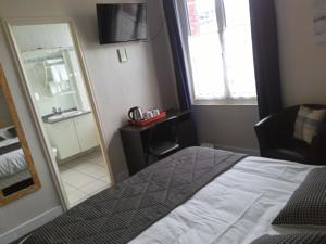 Hotel De La Paix : photos des chambres