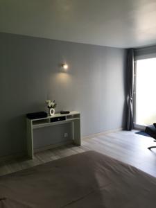 Appartement Au Pied De La Roche : photos des chambres