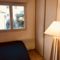 Appartement Petit F2 douillet a 5 mn Paris : photos des chambres