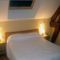 Hotel A La Queue Du Milan : photos des chambres