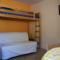 Appartement Au Coeur de Bourg... : photos des chambres