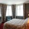 Hotel Les Lions De Beauclerc : photos des chambres