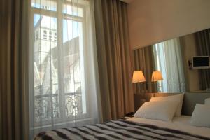 Le Cesar Hotel : photos des chambres