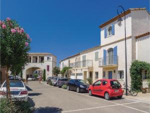 Hebergement Three-Bedroom Holiday home Aigues-Mortes 0 05 : photos des chambres