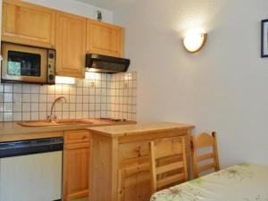 Appartement Apartment Alpina b : photos des chambres
