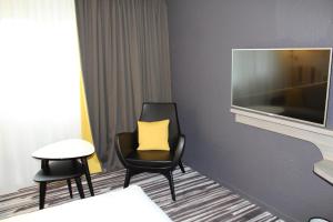 Hotel Golden Tulip Roissy Saint Witz : photos des chambres