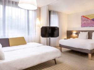 Hotel Novotel Suites Paris Roissy CDG : photos des chambres