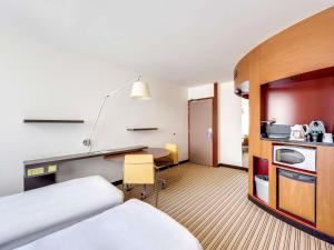 Hotel Novotel Suites Paris Nord 18eme : photos des chambres