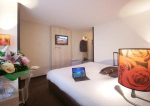 Hotel Inn Design Resto Novo Sable : photos des chambres