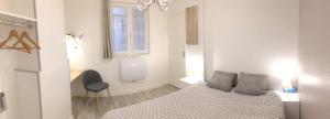 Appartement Apartment Rue de Vignier : photos des chambres
