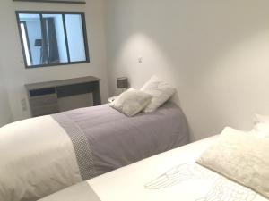 Appartement Apartment Rue des Oncheres : photos des chambres