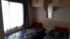 Hebergement MOBIL HOME GRAND LUXE 6/8 PERS CAMPING **** : photos des chambres