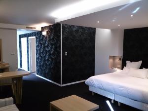 Hotel Logis - Le KONINE : photos des chambres