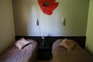 Hotel Les Beaux Soleils : photos des chambres