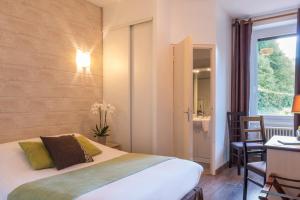 Hotel Logis Hostellerie des Monts Jura : photos des chambres