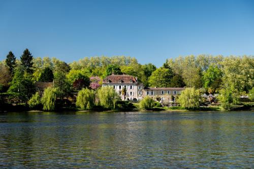 Holiday homes Les Magnolias : Hebergement proche de Badefols-sur-Dordogne