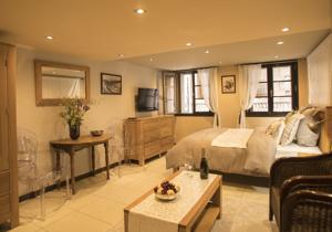 Hebergement Suites Coronell d'En Vila : photos des chambres