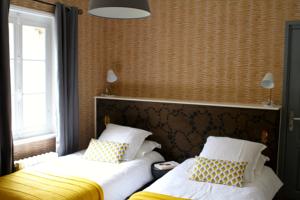 Chambres d'hotes/B&B Une Maison En Ville Chambre d'hotes : photos des chambres