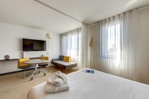 Hotel Novotel Suites Paris Nord 18eme : photos des chambres