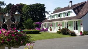 Chambres d'hotes/B&B Le Point du Jour : Chambre Triple - Vue sur Jardin