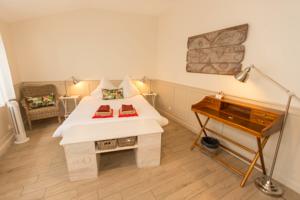 Hebergement La Maison Cachee : photos des chambres
