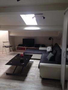 Coquet appartement avec terrasse ! : photos des chambres