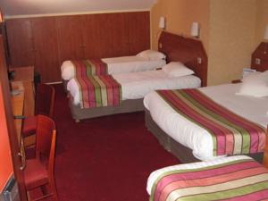 Hotel Kyriad Nimes Ouest : photos des chambres