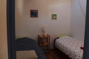 Hebergement Maison Sous les Platanes : photos des chambres