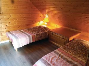 Hebergement Four-Bedroom Holiday Home in Gerardmer : photos des chambres