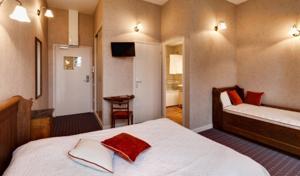 Hebergement La Maison Des Officiers : photos des chambres