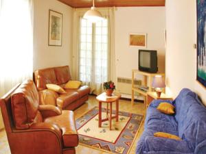 Appartement Apartment Rue Anatole France : photos des chambres