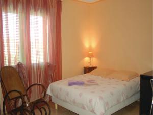Hebergement Four-Bedroom Holiday Home in Uchaud : photos des chambres