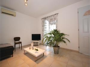 Hebergement Two-Bedroom Holiday Home in Calvisson : photos des chambres