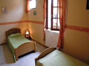 Hebergement Holiday home Ferme de la Butte I-865 : photos des chambres