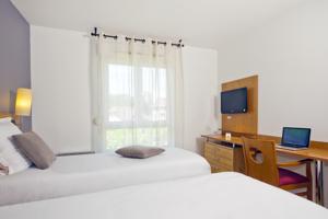 Hebergement Sejours & Affaires Annecy Le Pont Neuf : photos des chambres