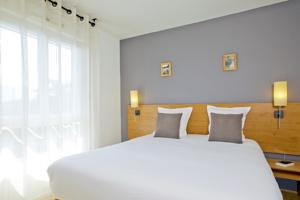 Hebergement Sejours & Affaires Annecy Le Pont Neuf : photos des chambres