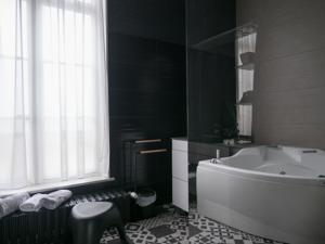 Chambres d'hotes/B&B Une Maison En Ville Chambre d'hotes : photos des chambres