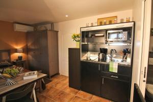 Appartement Harmonice & Spa : photos des chambres