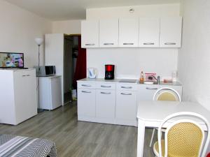 Appartement Studio vue sur mer : photos des chambres