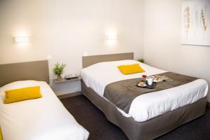 Hotel De La Pommeraie : photos des chambres